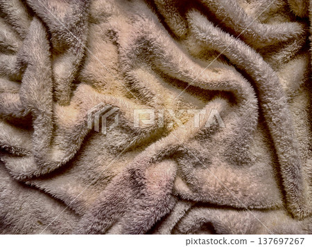 soft beige fluffy towel texture close-up with wavy folds for web design background soft beige fluffy towel texture close-up with wavy folds for web design background 137697267