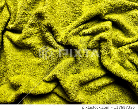 luxury chartreuse terry cloth fabric texture with deep folds and soft pile, abstract textile background for web design, print media, branding, packaging, and modern visual identity use 137697356