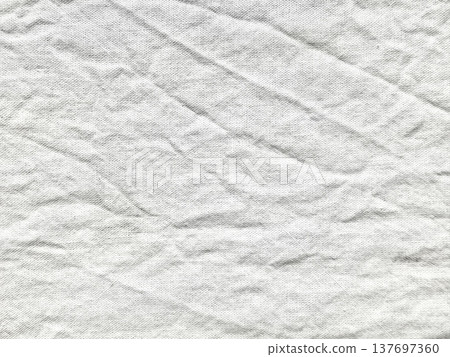 soft light gray wrinkled fabric texture background with fine weave detail for web design, print media, branding identity, textile mockup, minimalist layout, and neutral abstract surface use 137697360