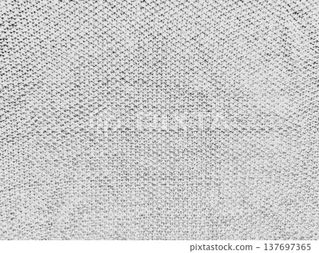 intricate light gray knit fabric texture close-up with uniform woven pattern and soft neutral tones, ideal seamless background for minimalist web design, sophisticated print media, or modern branding 137697365