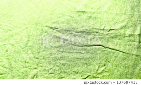 vibrant lime green wrinkled fabric texture closeup capturing soft folds and subtle shadows evoking fresh spring vibe for abstract wallpaper or banner background vibrant lime green wrinkled fabric texture closeup capturing soft folds and subtle shadows evoking fresh spring vibe for abstract wallpaper or banner background 137697415