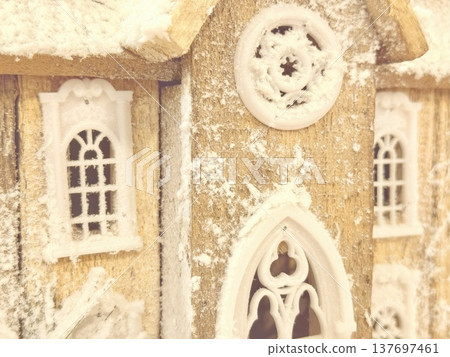 enchanting snowy gingerbread cathedral closeup featuring ornate gothic windows and frosty rose motifs perfect for holiday wallpapers and festive editorial illustrations enchanting snowy gingerbread cathedral closeup featuring ornate gothic windows and frosty rose motifs perfect for holiday wallpapers and festive editorial illustrations 137697461