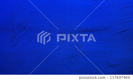 vibrant ultramarine blue textured wall abstract background with subtle brush strokes evoking serene depth for digital wallpaper and banner copy space 137697469