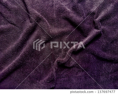 deep purple terry cloth texture folds softly with gradient shadows evoking luxury for background wallpaper or banner copy space deep purple terry cloth texture folds softly with gradient shadows evoking luxury for background wallpaper or banner copy space 137697477