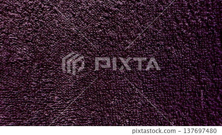 vibrant deep purple terry cloth texture closeup abstract soft looped fabric surface evoking luxury for wallpaper or design banner background 137697480