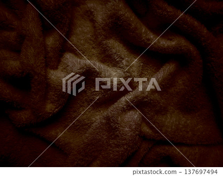 rich chocolate brown fleece texture undulates in soft folds evoking cozy warmth perfect for autumn wallpaper or inviting commercial backdrop 137697494