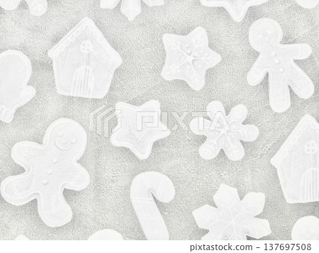 white christmas cookie cutters assortment scattered on soft textured sandy surface capturing festive holiday whimsy for winter wallpaper or banner with copy space white christmas cookie cutters assortment scattered on soft textured sandy surface capturing festive holiday whimsy for winter wallpaper or banner with copy space 137697508