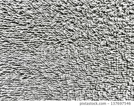 soft grey textured fabric surface with dense looped fibers for modern web design, branding, print background, and digital layout detail in minimalist tactile aesthetic 137697546
