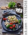 Rye crispbread open sandwich with feta and peppers 137698268