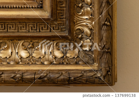 Macro photography of a gilded frame corner Macro photography of a gilded frame corner 137699138