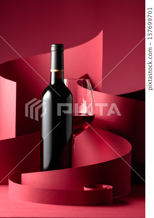 Bottle and glass of red wine. Bottle and glass of red wine. 137699701