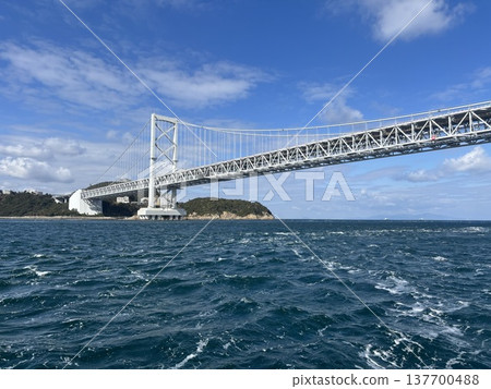 Naruto Strait Bridge as seen from a sightseeing boat Naruto Strait Bridge as seen from a sightseeing boat 137700488