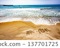 letters written on the beach 137701725