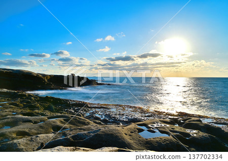 beautiful beach sunset 137702334