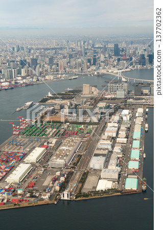 An aerial view of the Odaiba area and Rainbow Bridge from an airplane. An aerial view of the Odaiba area and Rainbow Bridge from an airplane. 137702362