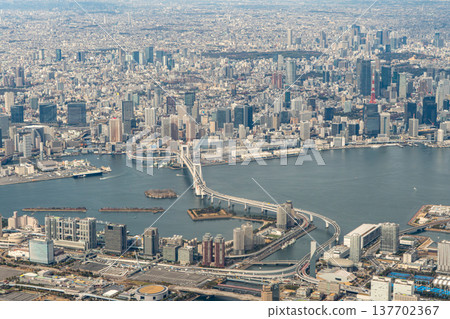 An aerial view of the Odaiba area and Rainbow Bridge from an airplane. An aerial view of the Odaiba area and Rainbow Bridge from an airplane. 137702367