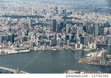 An aerial view of the Odaiba area and Rainbow Bridge from an airplane. An aerial view of the Odaiba area and Rainbow Bridge from an airplane. 137702368