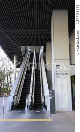 Escalator at Toyosu Civic Center leading to Yurikamome Toyosu Station Escalator at Toyosu Civic Center leading to Yurikamome Toyosu Station 137704151
