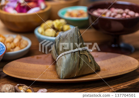 Traditional handmade rice dumplings and abundant ingredients for Dragon Boat Festival 137704501