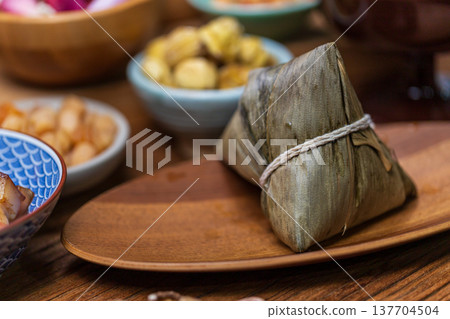 Traditional handmade rice dumplings and abundant ingredients for Dragon Boat Festival Traditional handmade rice dumplings and abundant ingredients for Dragon Boat Festival 137704504