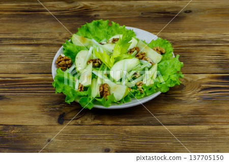 Waldorf salad on a wooden table Waldorf salad on a wooden table 137705150