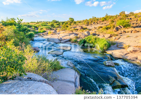 View of Tokovsky waterfalls on the Kamenka river in Dnipropetrovsk region, Ukraine 137705394