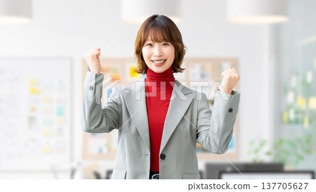 Woman/businesswoman doing a fist pump 137705627