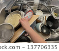 Washing dishes 137706335