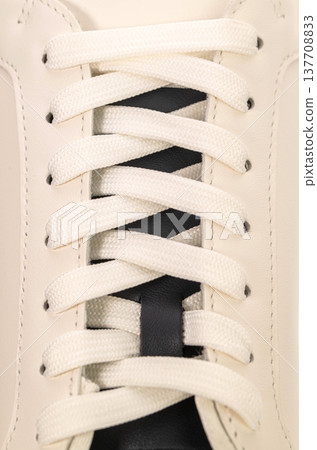 Clean white sneaker detail with black stripe Clean white sneaker detail with black stripe 137708833