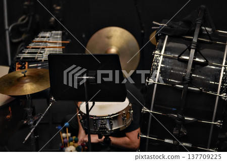 Percussion instruments on stage with drums cymbal and music stand Percussion instruments on stage with drums cymbal and music stand 137709225