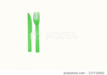 Green plastic knife fork for camping, isolated on white Green plastic knife fork for camping, isolated on white 137710082