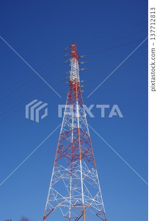 Red and white power transmission tower (Yokkaichi City, Mie Prefecture) 137712813