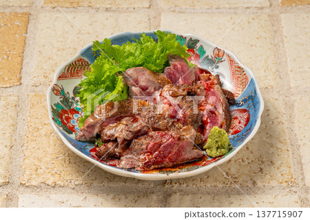 Grilled Meat: A rare cut of meat grilled over charcoal for a fragrant finish. Grilled Meat: A rare cut of meat grilled over charcoal for a fragrant finish. 137715907
