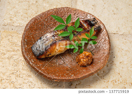 Sawara (Spanish mackerel) grilled in Saikyo miso: A refined Japanese fish dish. Sawara (Spanish mackerel) grilled in Saikyo miso: A refined Japanese fish dish. 137715919