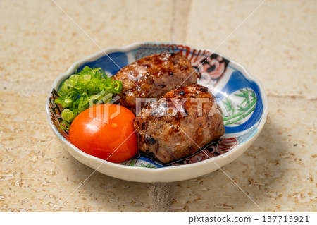 Chicken meatballs with egg yolk: Grilled chicken meatballs served with rich egg yolk. Chicken meatballs with egg yolk: Grilled chicken meatballs served with rich egg yolk. 137715921
