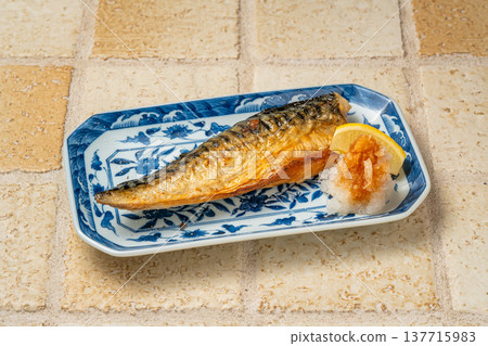 Grilled mackerel with salt: A classic Japanese fish dish, grilled to perfection. 137715983
