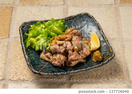 Grilled Chicken Thigh: A chicken dish finished with a fragrant aroma over charcoal. 137716040