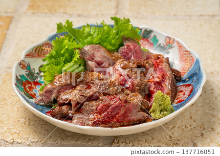 Grilled Meat: A rare cut of meat grilled over charcoal for a fragrant finish. Grilled Meat: A rare cut of meat grilled over charcoal for a fragrant finish. 137716051