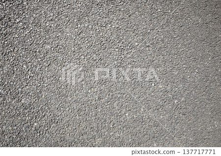 Cracked asphalt road surface texture Cracked asphalt road surface texture 137717771