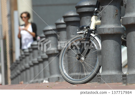 Parking The Bicycle On Fence Parking The Bicycle On Fence 137717984
