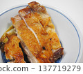 Arrangement of sliced grilled chicken thighs 137719279