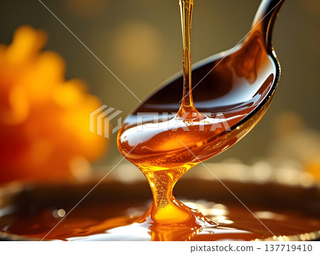 organic honey dripping from the bowl organic honey dripping from the bowl 137719410