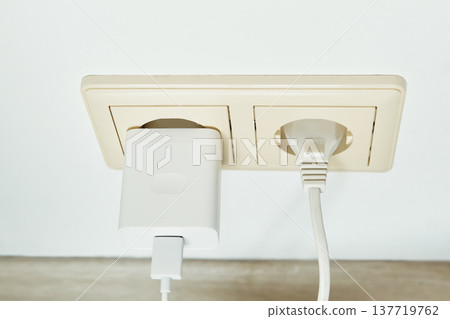 Electrical power outlet with charger and power plug supplying energy Electrical power outlet with charger and power plug supplying energy 137719762