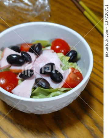 Home-style cooking: small bowl salad, ham, lettuce, tomato, black beans. Home-style cooking: small bowl salad, ham, lettuce, tomato, black beans. 137720711