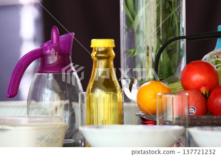 Empty Color Glass Bottle on the table Empty Color Glass Bottle on the table 137721232