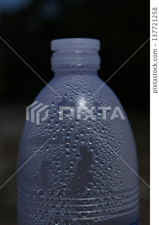 Empty Color Glass Bottle on the table Empty Color Glass Bottle on the table 137721258