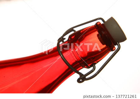 Empty Color Glass Bottle on the table Empty Color Glass Bottle on the table 137721261