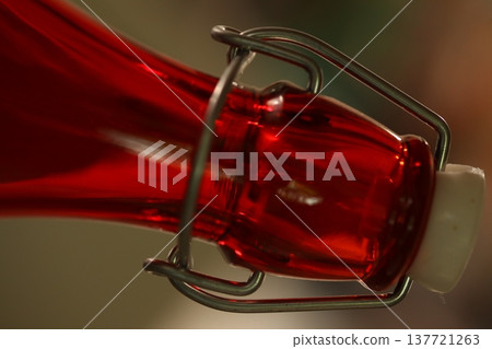 Empty Color Glass Bottle on the table Empty Color Glass Bottle on the table 137721263