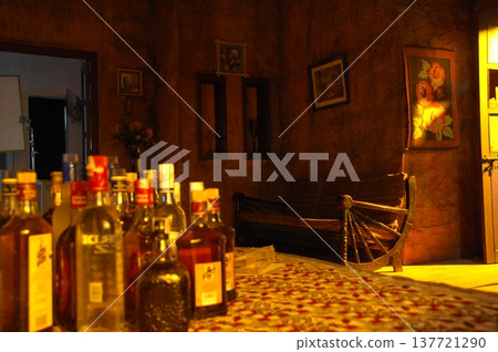 Empty Color Glass Bottle on the table Empty Color Glass Bottle on the table 137721290
