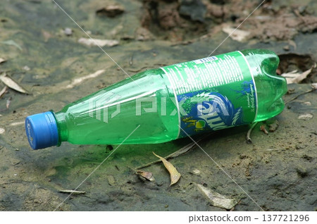 Empty Color Glass Bottle on the table Empty Color Glass Bottle on the table 137721296